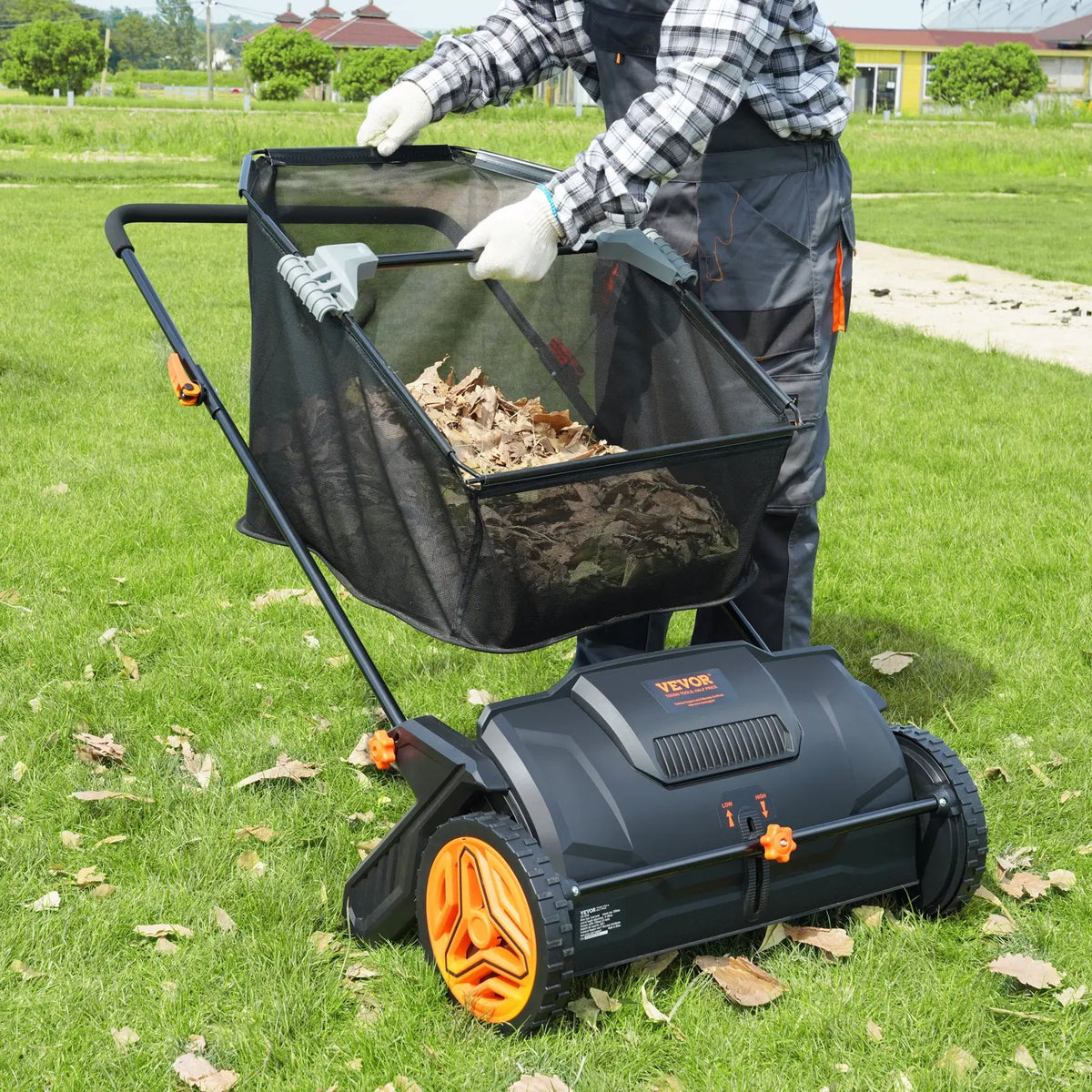 Collection bag lifted from the 21-inch hand-push lawn sweeper